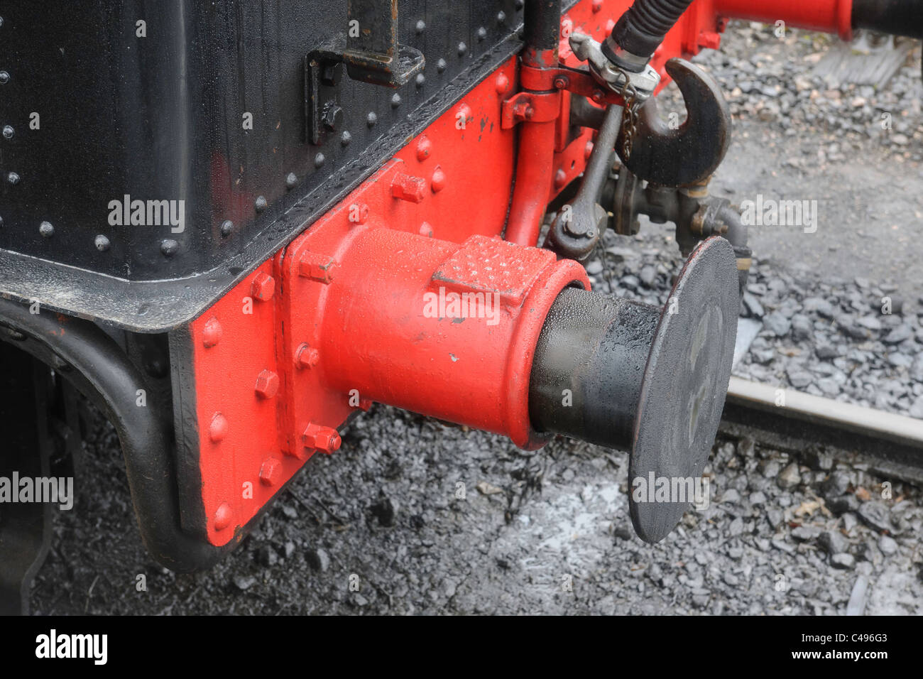 Close up dettaglio del treno a vapore di buffer e accoppiamento. Foto Stock
