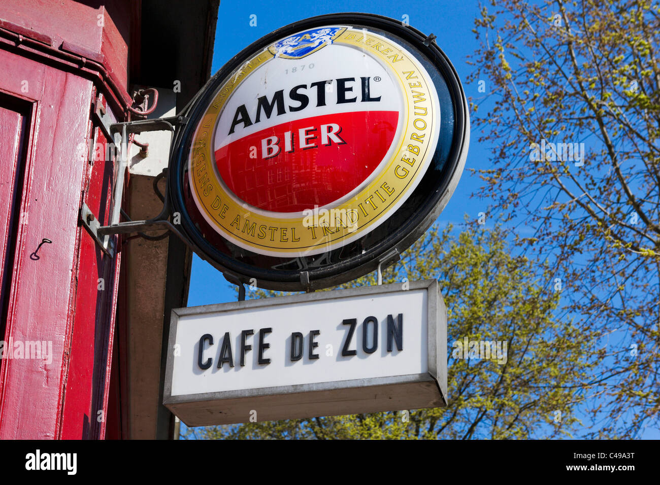 Segno per Amstel birra al di fuori di un bar nel quartiere a luci rosse di Amsterdam, Paesi Bassi Foto Stock