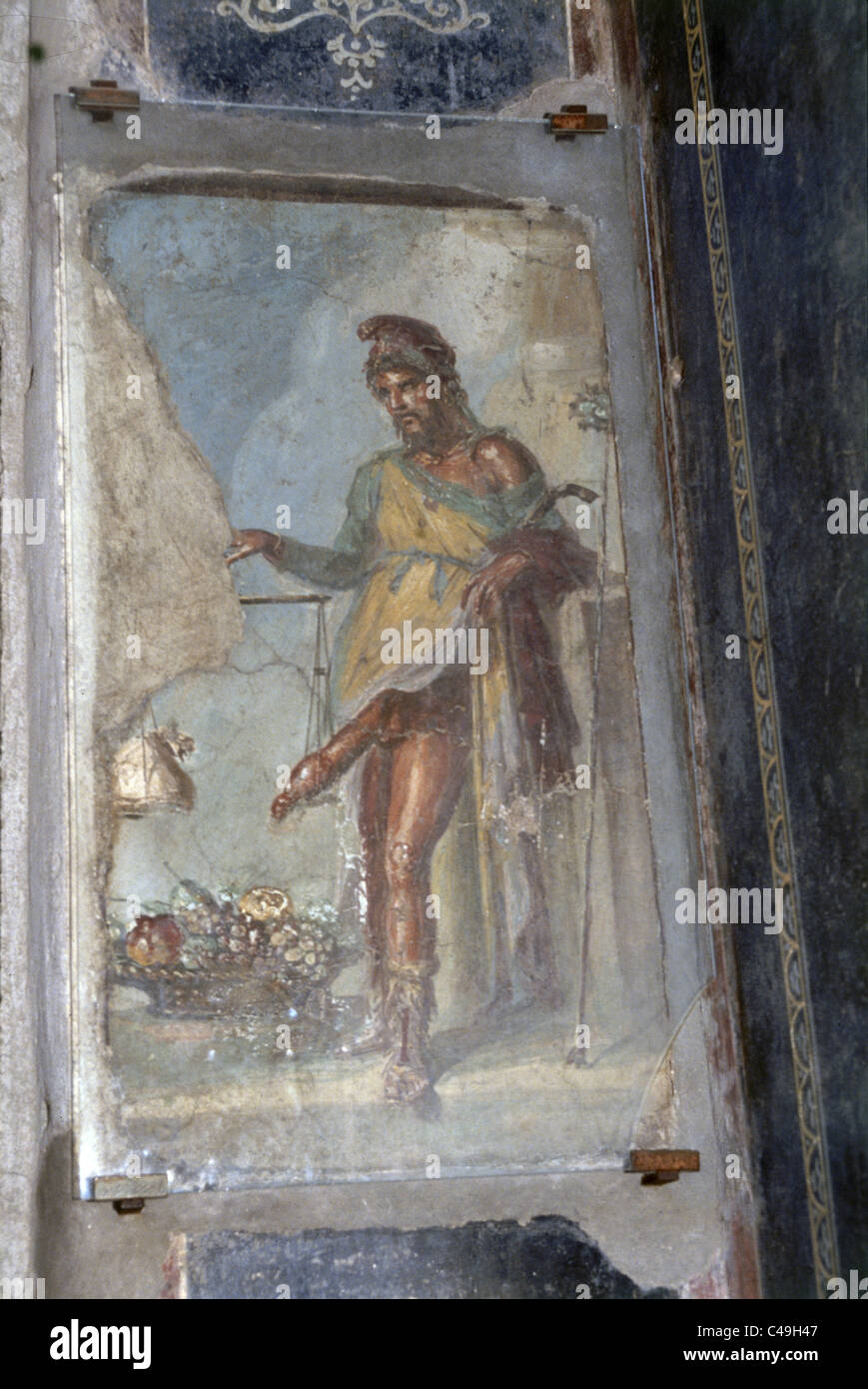 Fotografia di un dipinto di un soldato romano su una parete nelle rovine dell antica città romana di Pompei Foto Stock