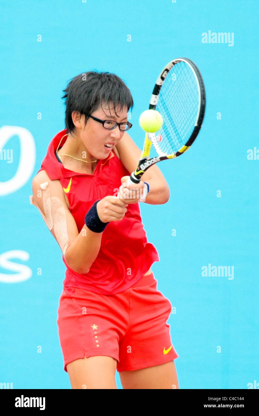 Zheng Saisai della Cina in azione durante le ragazze' Singles finali. Foto Stock