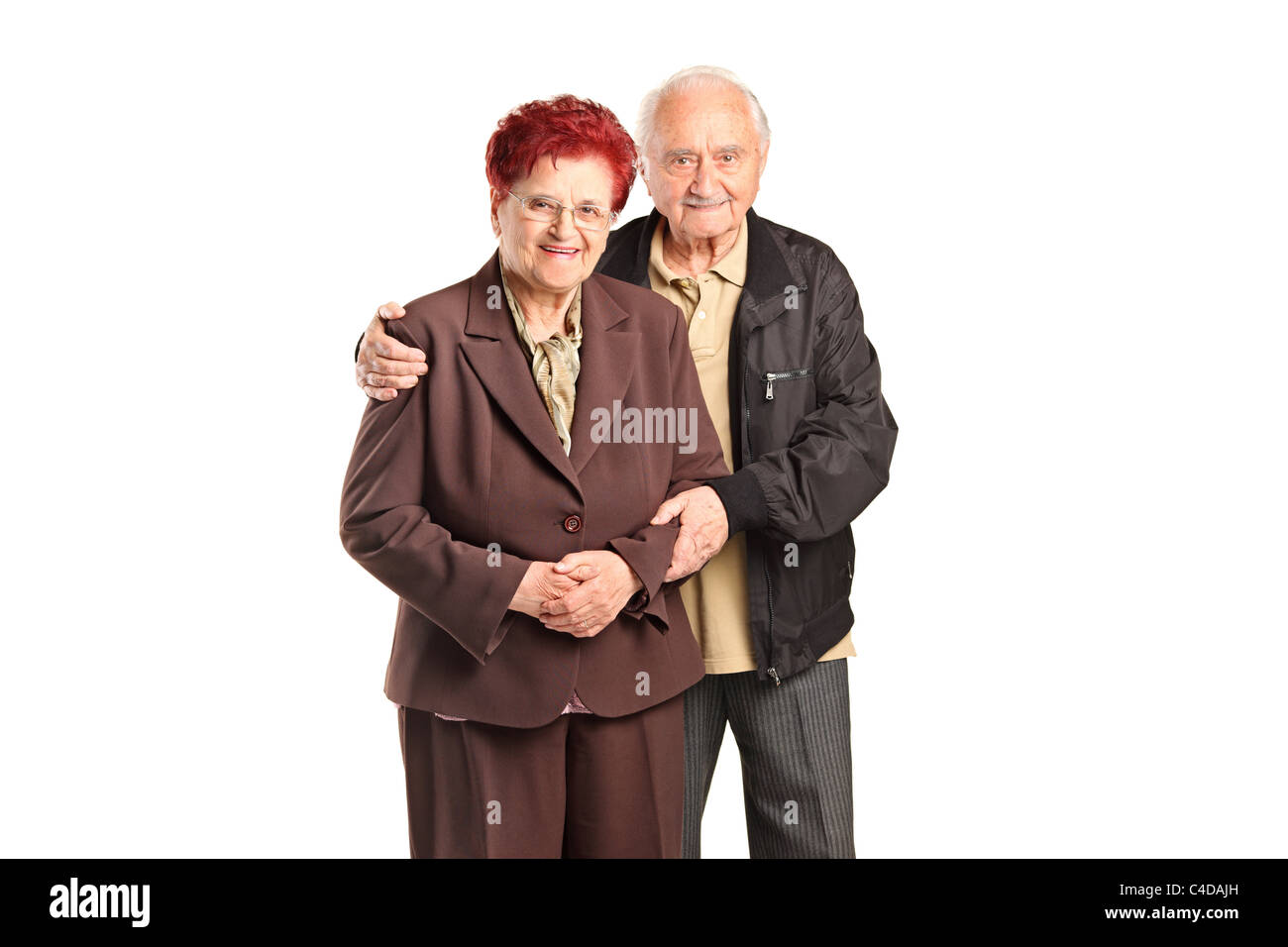 Sorridente coppia senior in posa Foto Stock