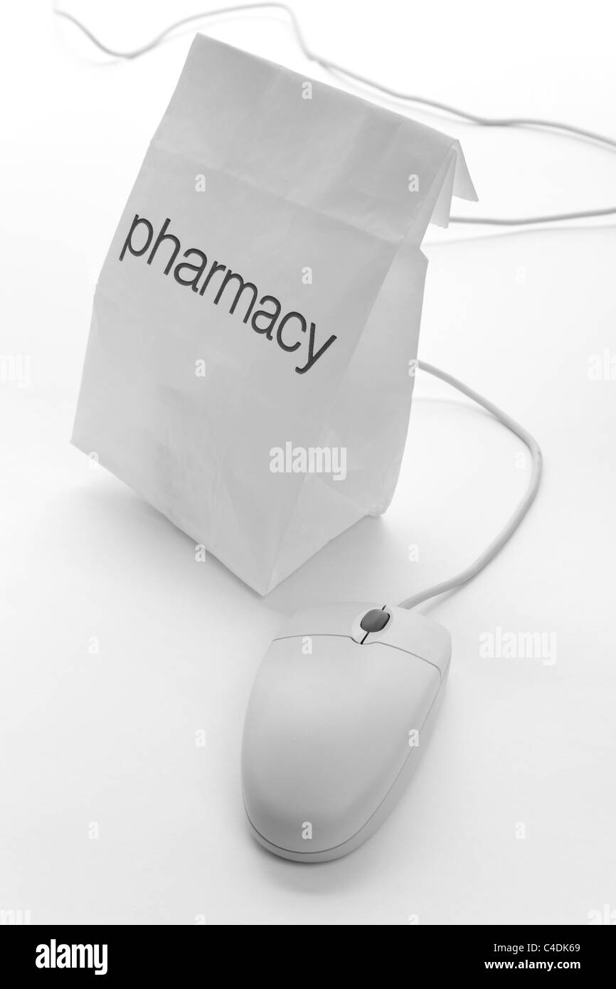Farmacia sacco e il mouse del computer Foto Stock