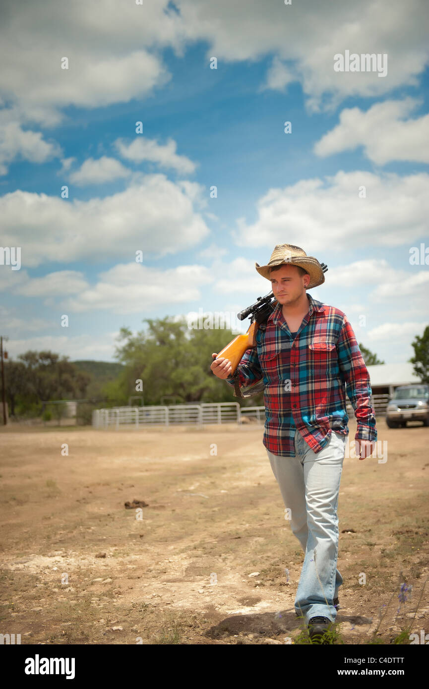Ranch cowboy con arma da fuoco Foto Stock