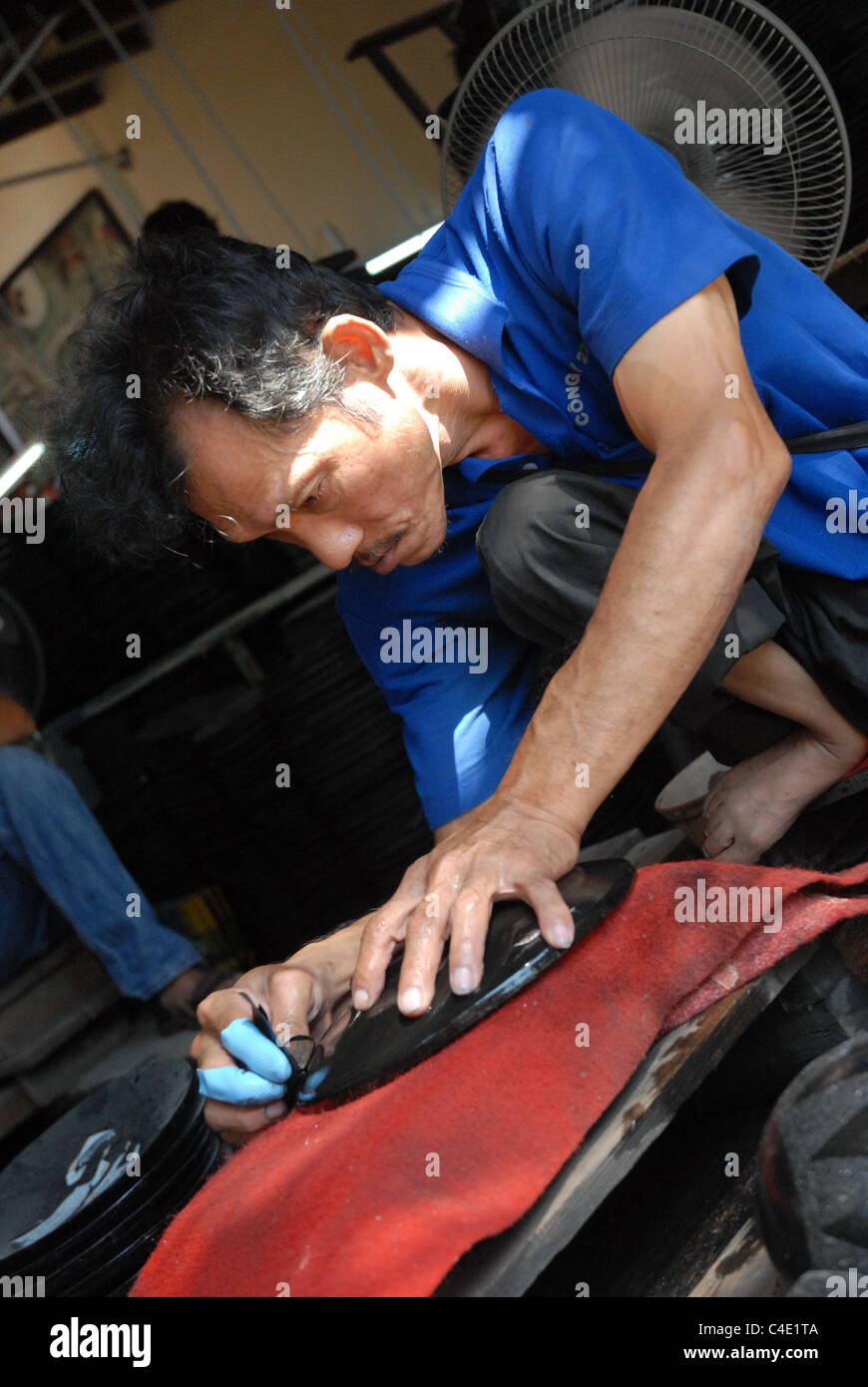 Madreperla lavoratori, a Saigon, Vietnam. Foto Stock