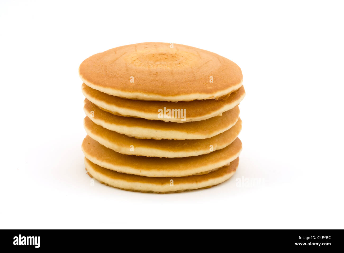 Pila di frittelle isolato su bianco Foto Stock