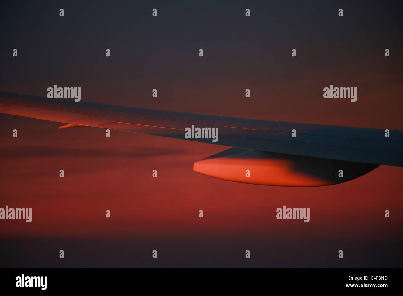 Ala di aeromobile a crepuscolo piano ala tramonto grafico Foto Stock