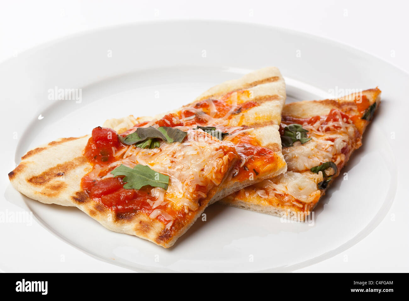 Fette di casalinga pizza margarita Foto Stock