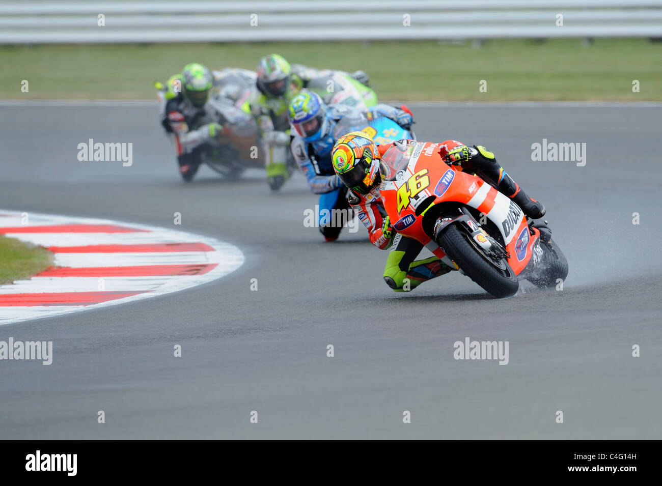 Valentino Rossi, Alvaro Bautista, Loris Capirossi e randy de Puniet in condizioni di bagnato, moto gp, 2011, Foto Stock