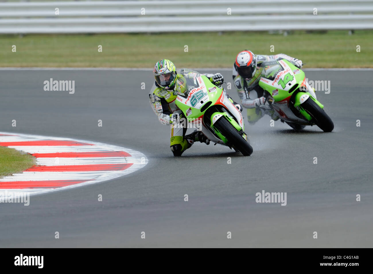 Loris Capirossi e randy de Puniet, Pramac Ducati. moto gp, 2011, bagnato, Foto Stock