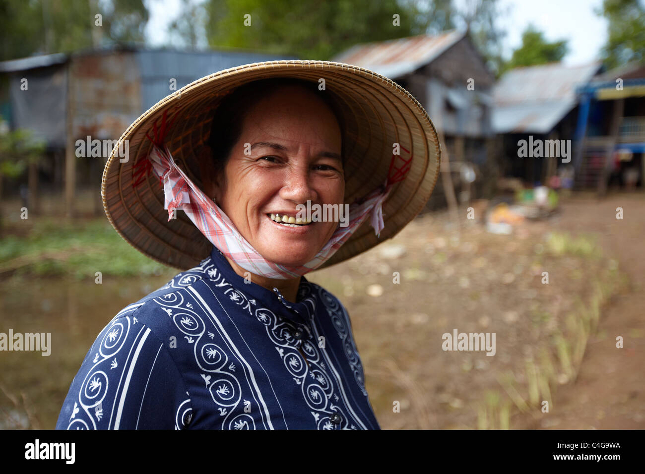Una donna nr Cau Doc, Delta del Mekong, Vietnam Foto Stock