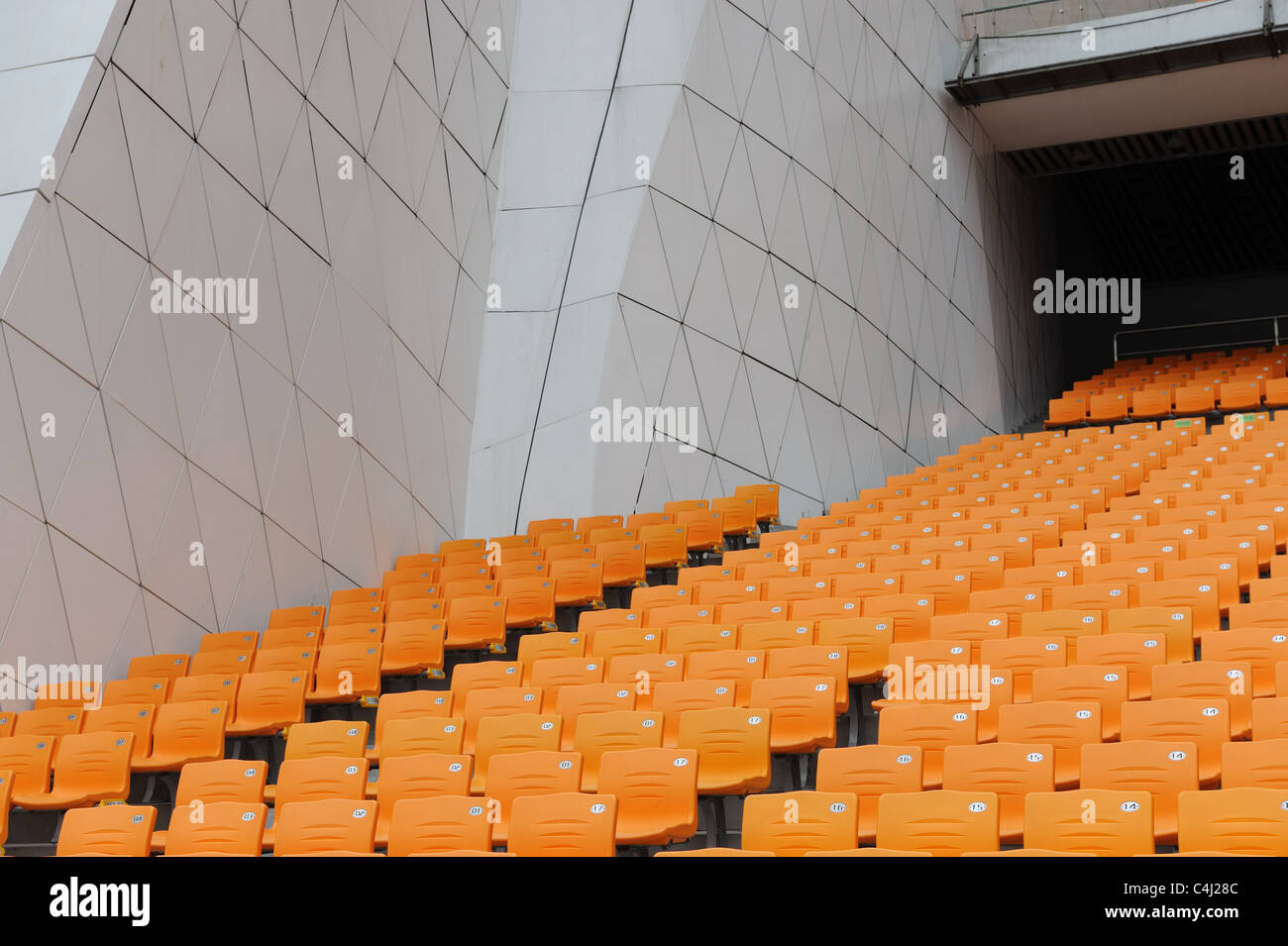 Le sedie in stadio sportivo Foto Stock