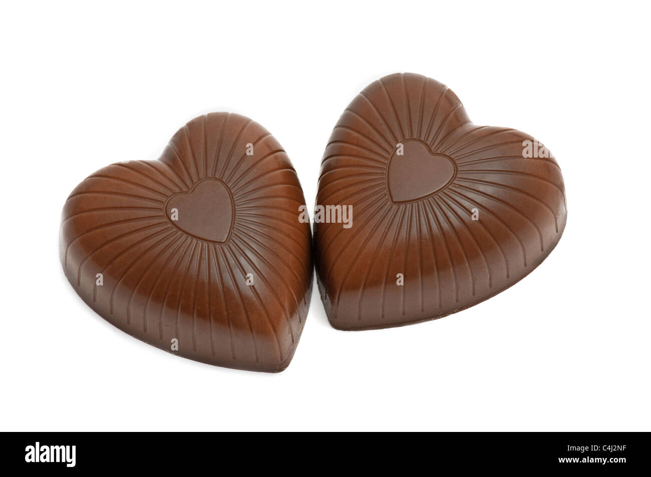 Coppia oftop vista di cioccolato a forma di cuore caramelle isolato su bianco Foto Stock