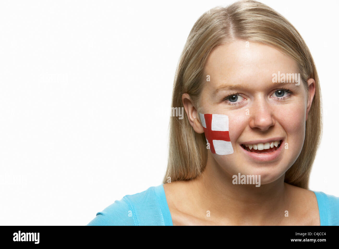 Giovani donne amanti dello sport con St Georges bandiera dipinta sul viso Foto Stock