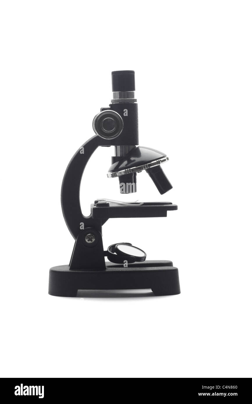 Mini in plastica microscopio giocattolo su sfondo bianco Foto Stock