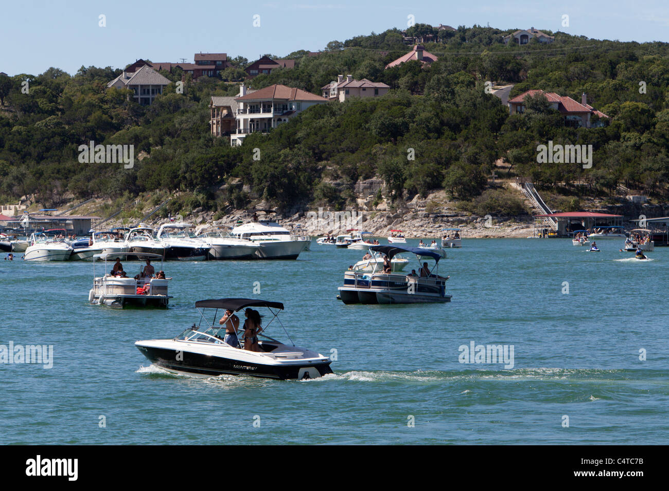 Frequentatori di partito in Devil's Cove sul Lago Travis di Austin in Texas Foto Stock