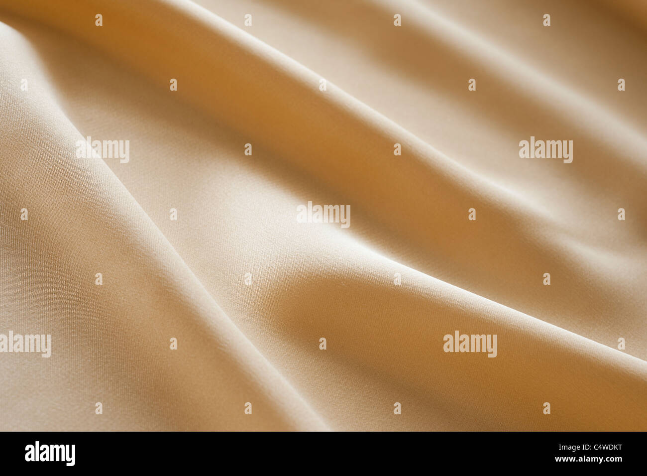 Crema di seta colorata Foto Stock