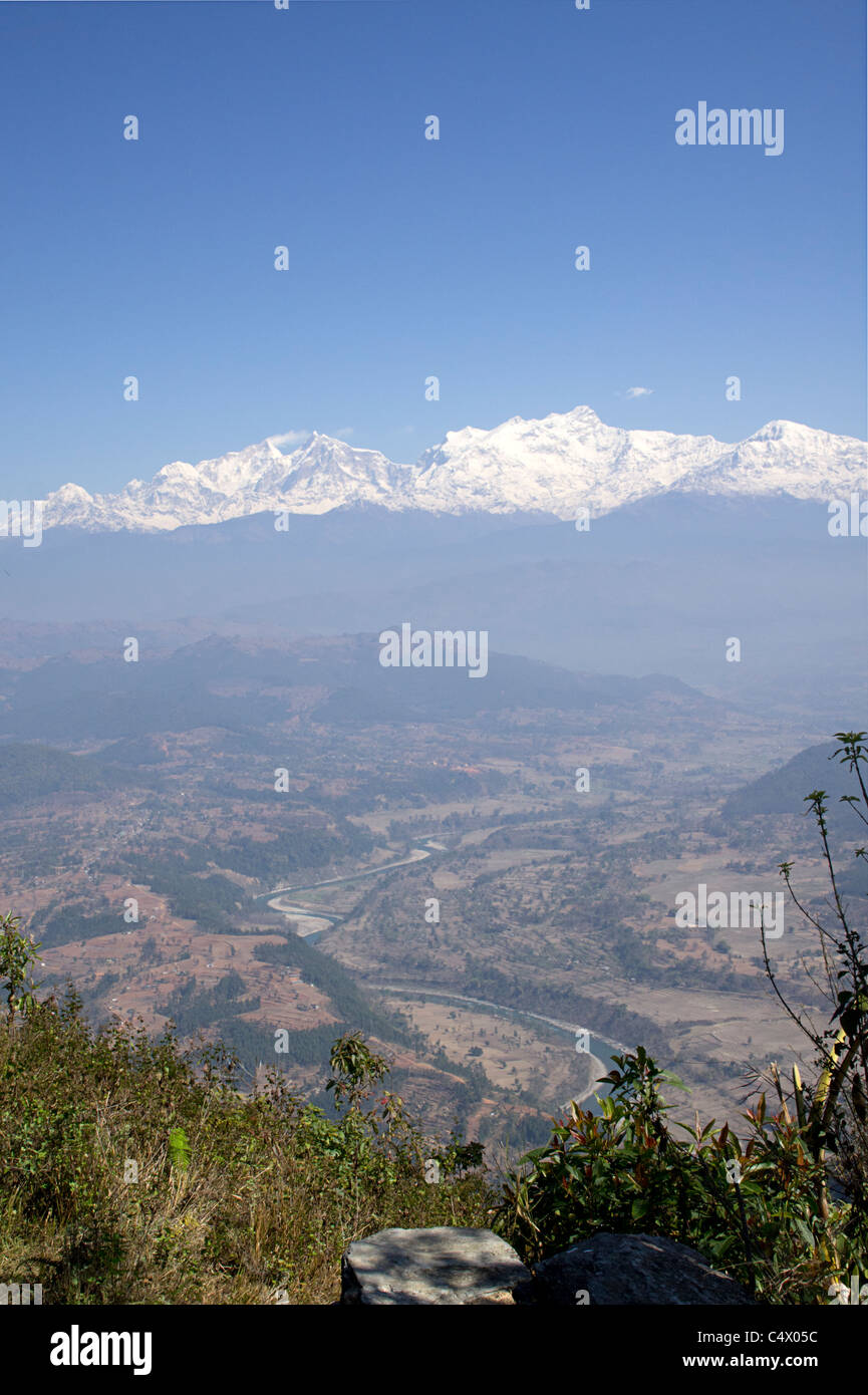 Valley vicino a Bandipur con la catena Hannapurna in background, Regione Occidentale, Nepal Foto Stock