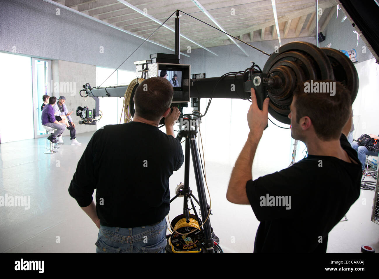 Riprese TV show tv telecamera braccio uomo Foto Stock