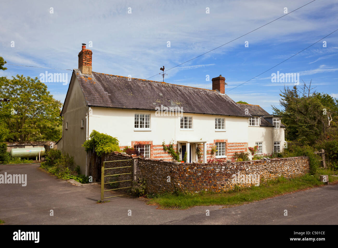 Old English country house cottage nel villaggio di Tarrant Monkton, Dorset, England, Regno Unito Foto Stock
