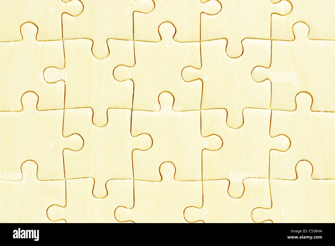 Close up di legno puzzle jigsaw sfondo Foto Stock