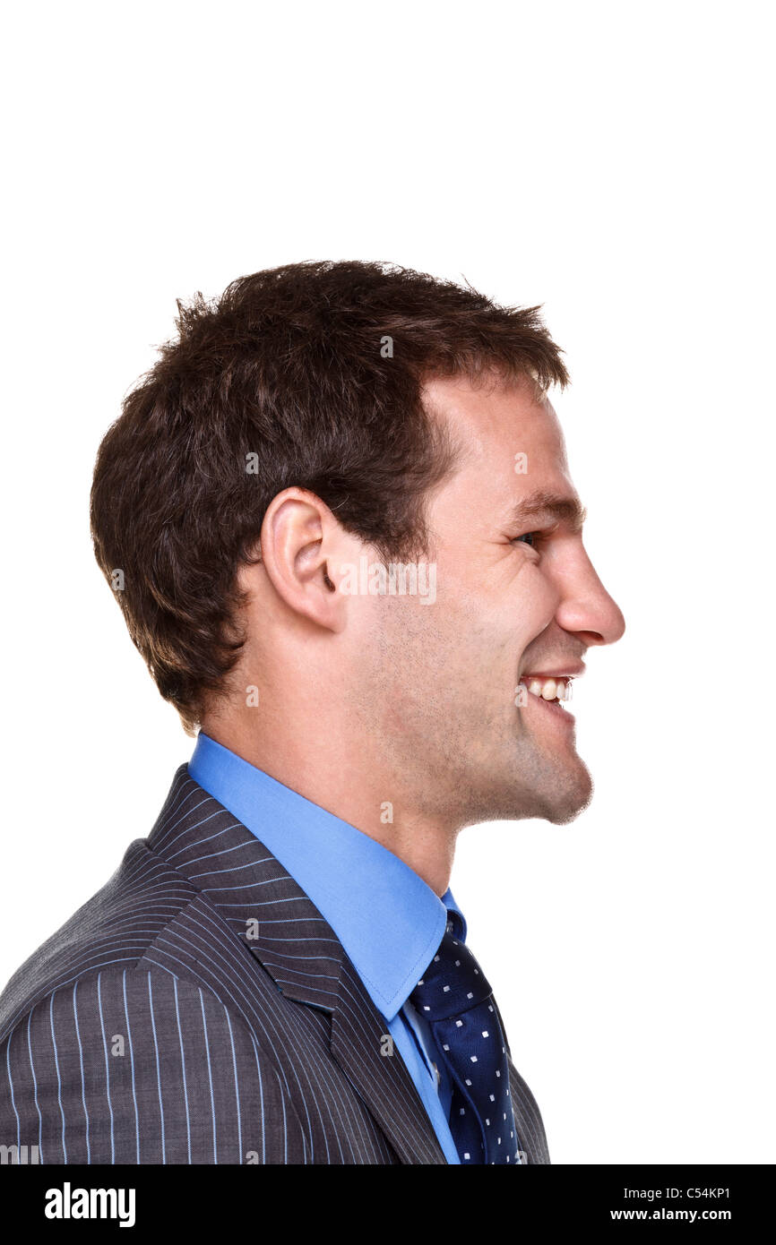 Foto di un imprenditore con una felice espressione sulla sua faccia, lato headshot isolato su uno sfondo bianco. Parte di una serie. Foto Stock