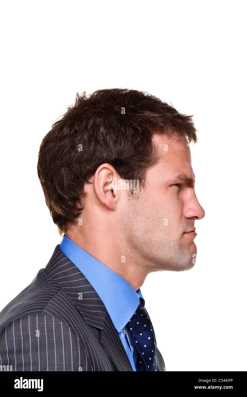 Foto di un imprenditore con un espressione sulla sua faccia, lato headshot isolato su uno sfondo bianco. Parte di una serie. Foto Stock
