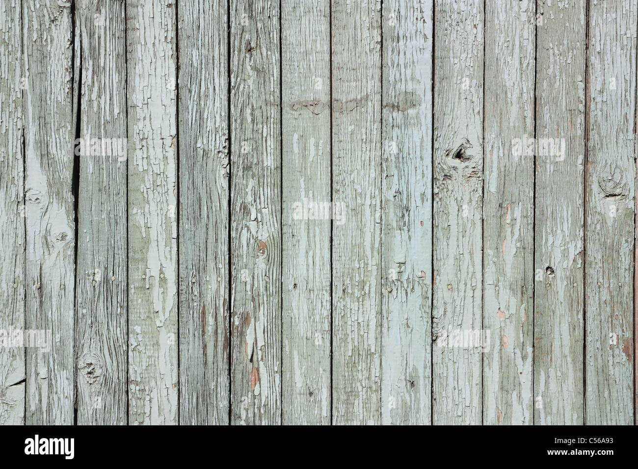 Un frammento di un vecchio, dipinto, recinzione di legno Foto Stock Un frammento di un vecchio, dipinto, recinzione di legno Foto Stock