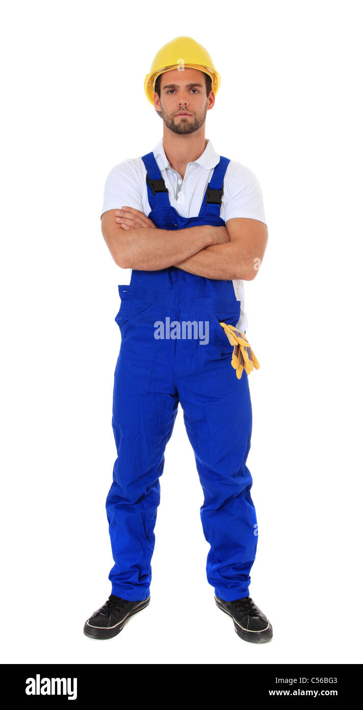 A piena lunghezza shot di un attraente lavoratore manuale. Tutto su sfondo bianco. Foto Stock