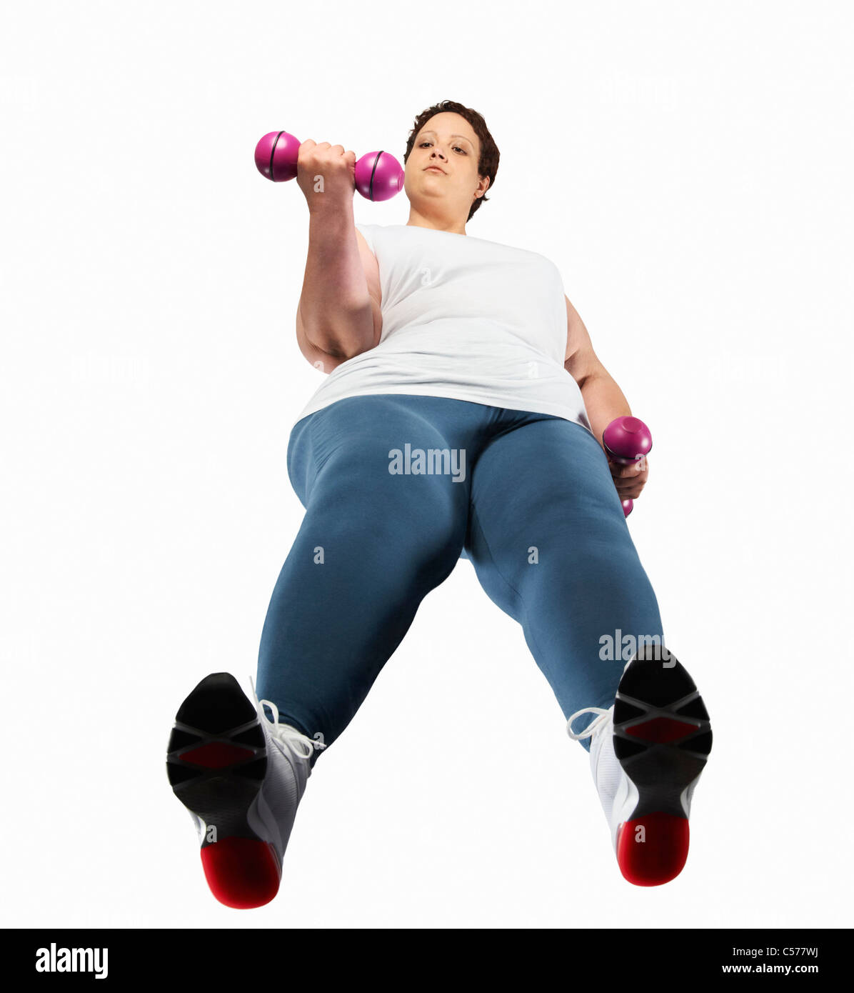 Grande donna sollevamento pesi Foto Stock