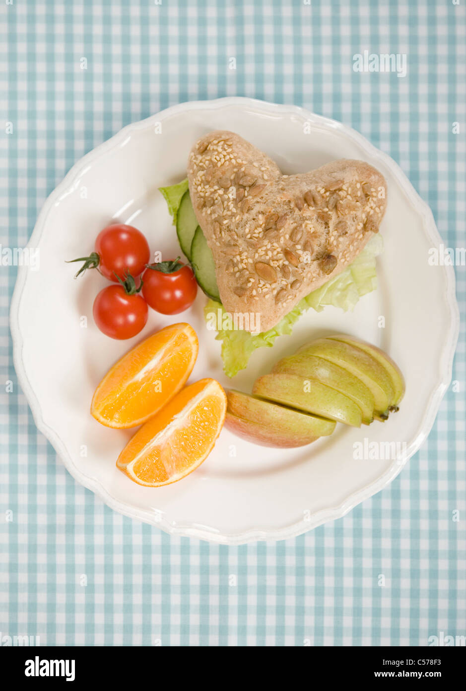 Piastra del pane, frutta e verdura Foto Stock