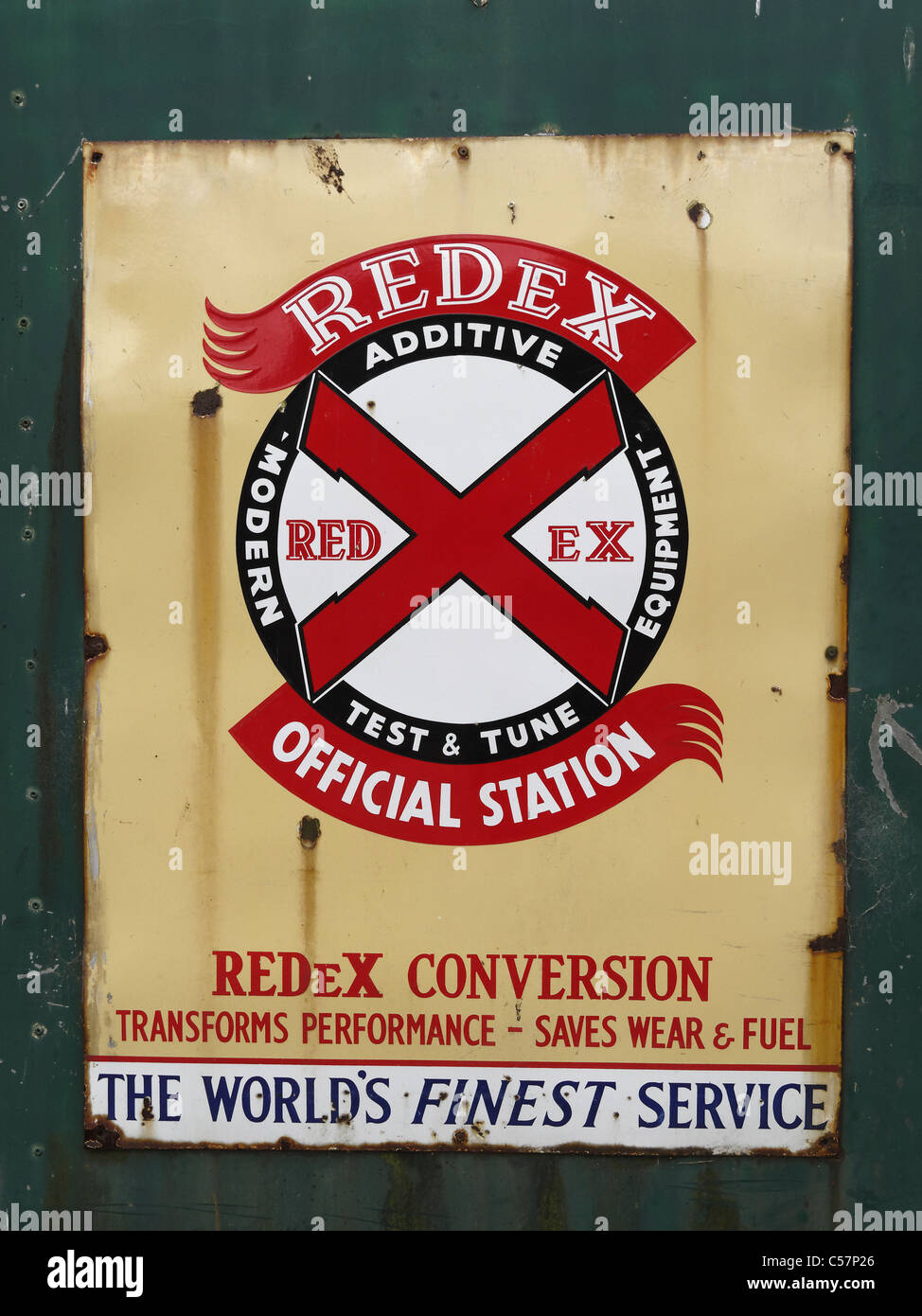 Un vecchio smalto pubblicità segno Redex additivo di carburante. Foto Stock