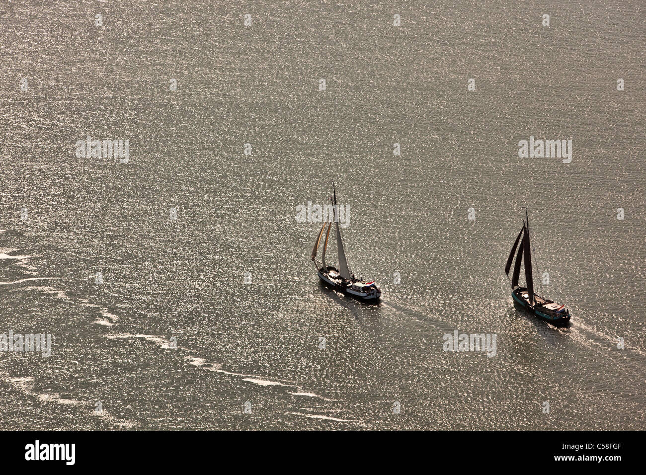 Holland, Isola di Terschelling, il Wadden Sea. Unesco - Sito Patrimonio dell'umanità. Antenna. Cargo tradizionali le navi a vela, crociere turistiche. Foto Stock