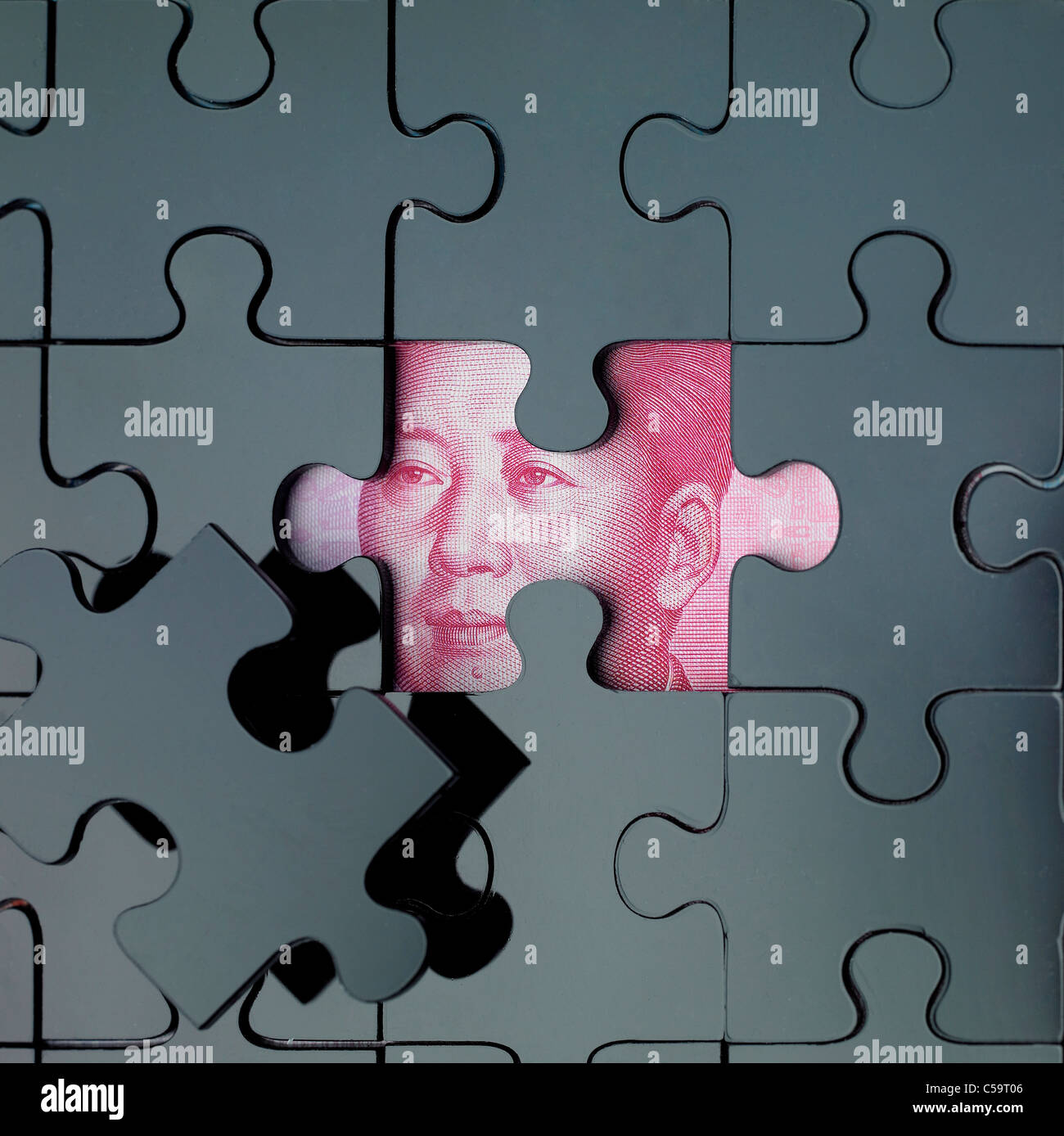 Close-up di puzzle e la banconota Foto Stock