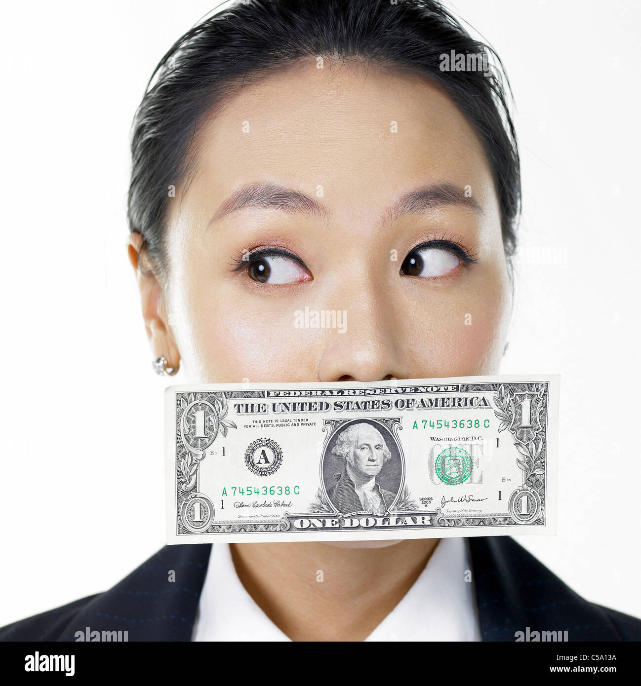 Close-up di imprenditrice azienda dollar Foto Stock