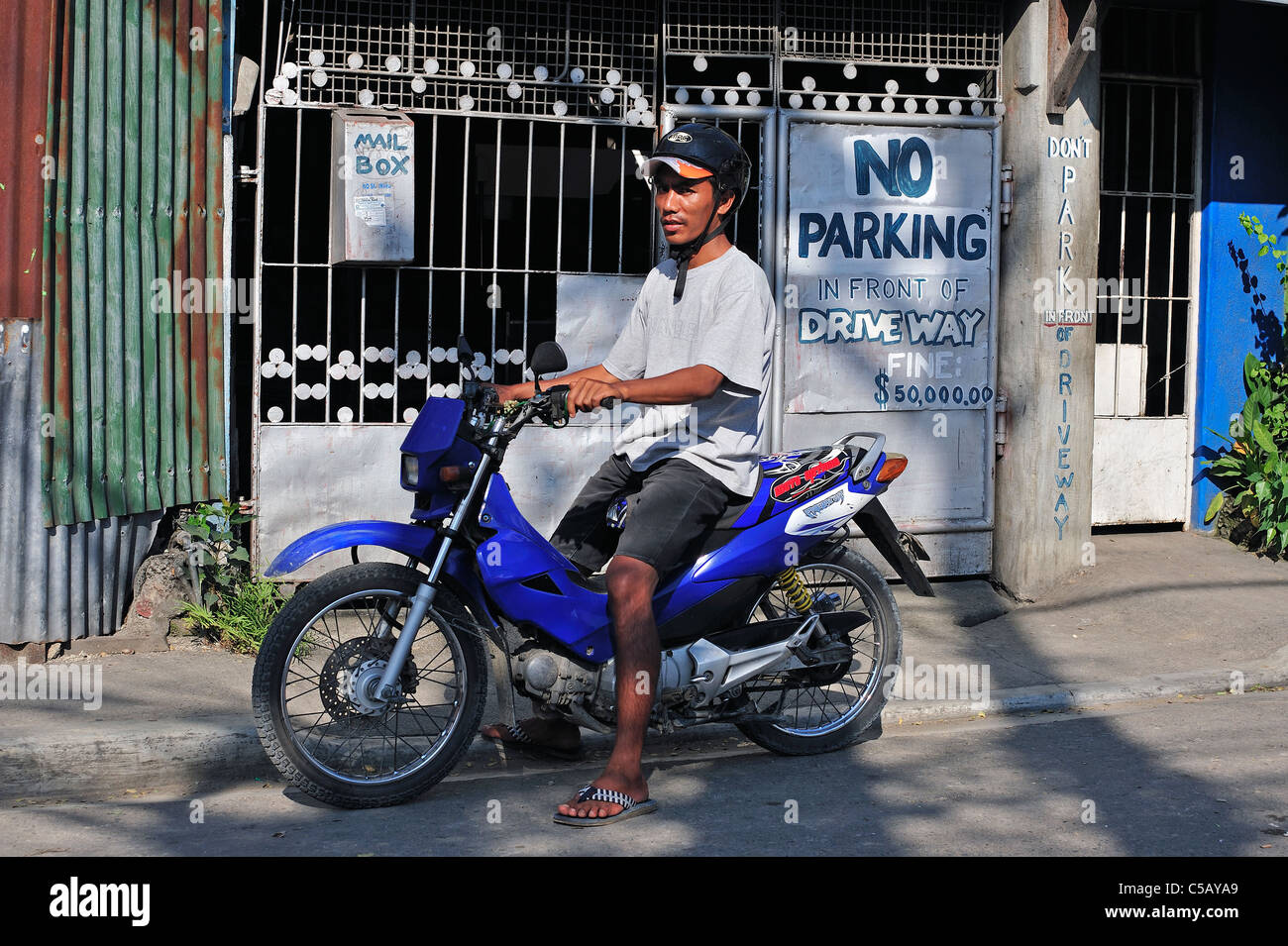 Motore ciclo taxi Rider Cebu Filippine Foto Stock