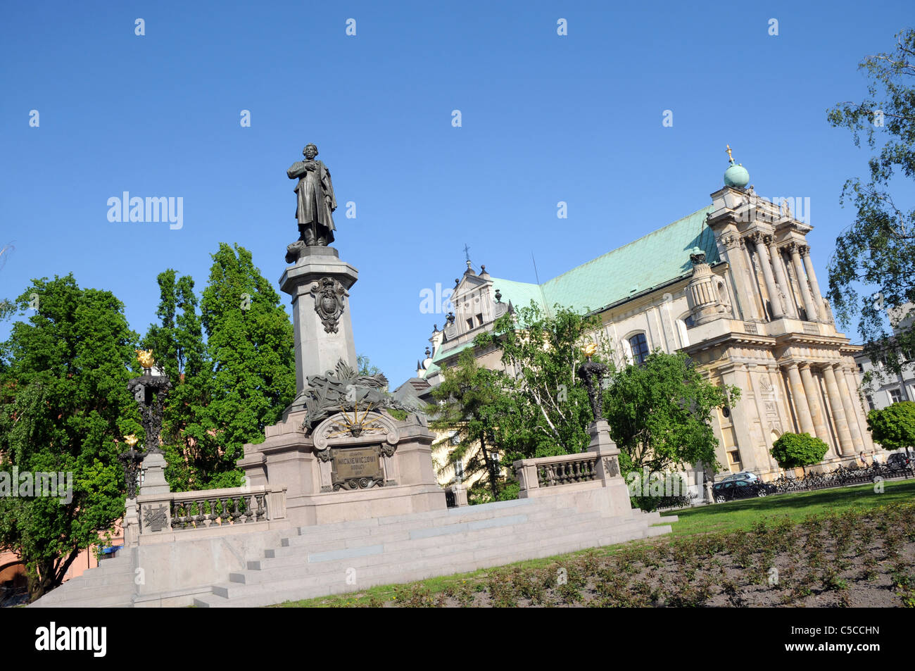 Adam Mickiewicz memorial a Varsavia Polonia e San Giuseppe chiesa cura, Krakowskie Przedmiescie Street Foto Stock