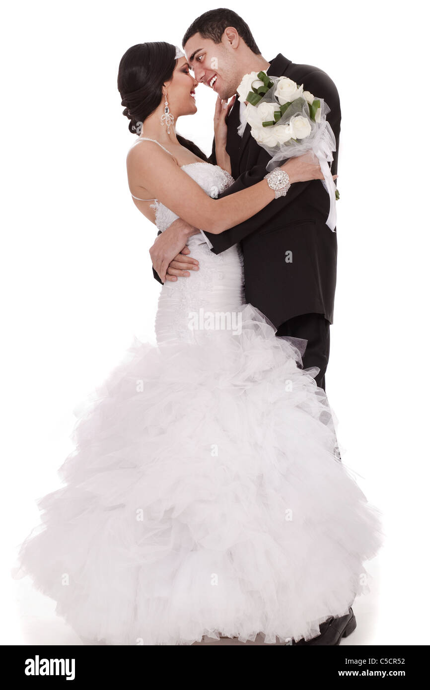 Primo ballo sposa e lo sposo su sfondo bianco Foto Stock