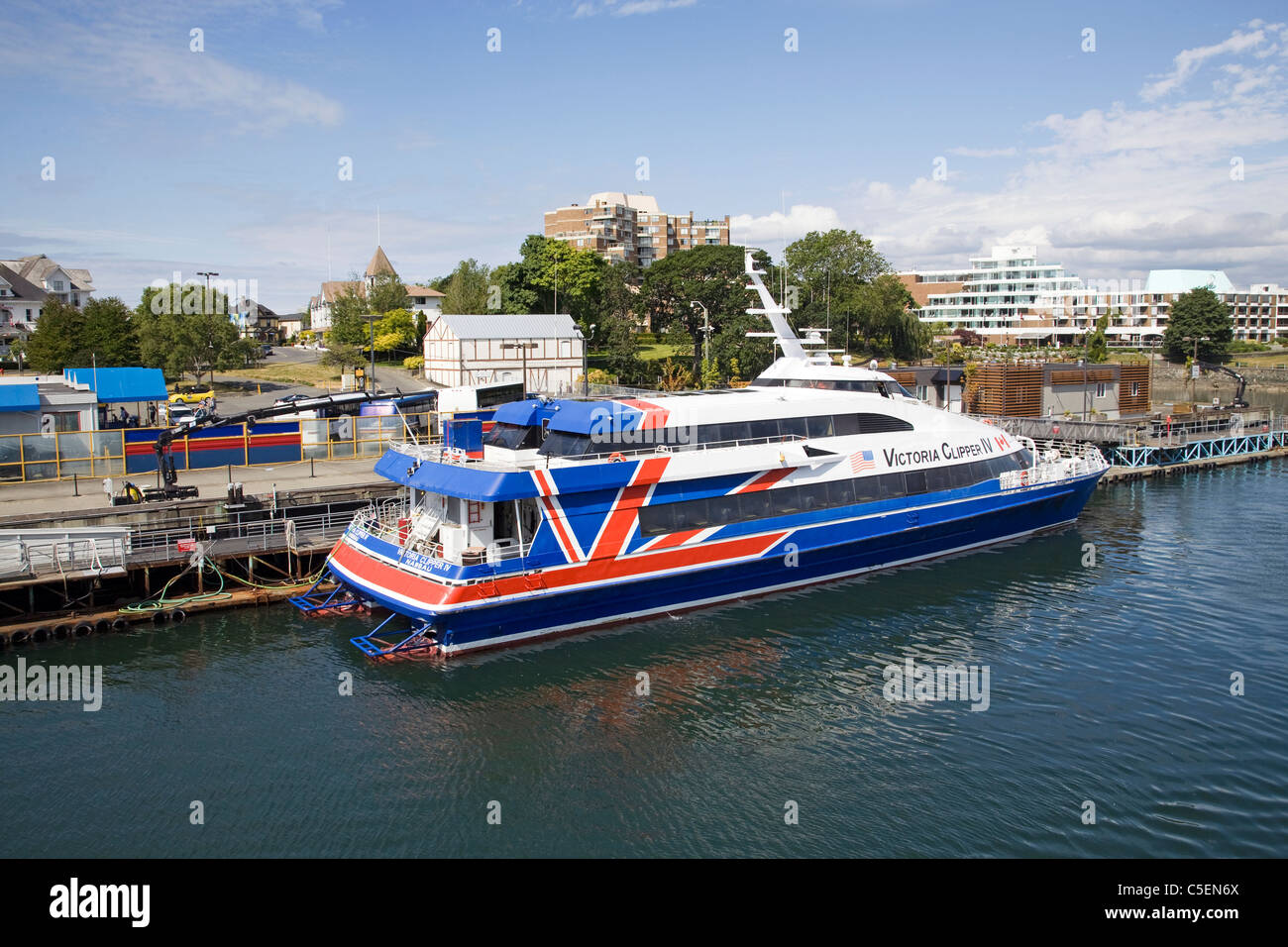 Il Victoria Clipper, un aliscafo che trasportano passeggeri barca al suo posto barca in Victoria British Columbia, Porto Foto Stock