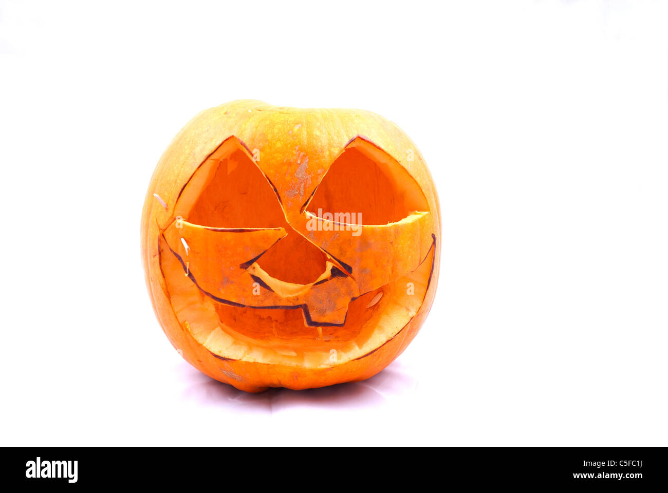 Una zucca scavata in una faccia per Halloween Foto Stock
