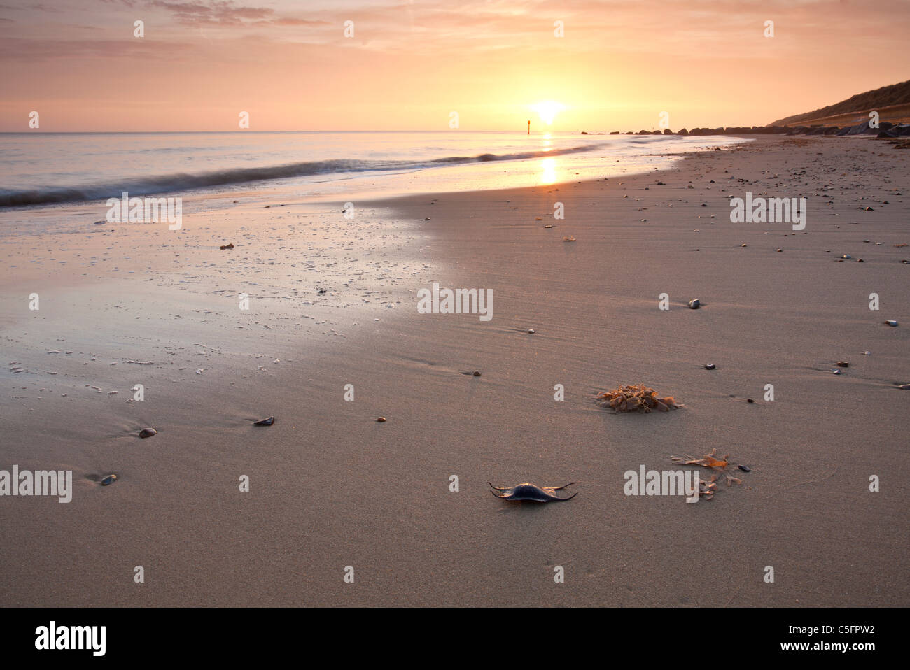 Waxham spiaggia al tramonto sulla costa di Norfolk Foto Stock
