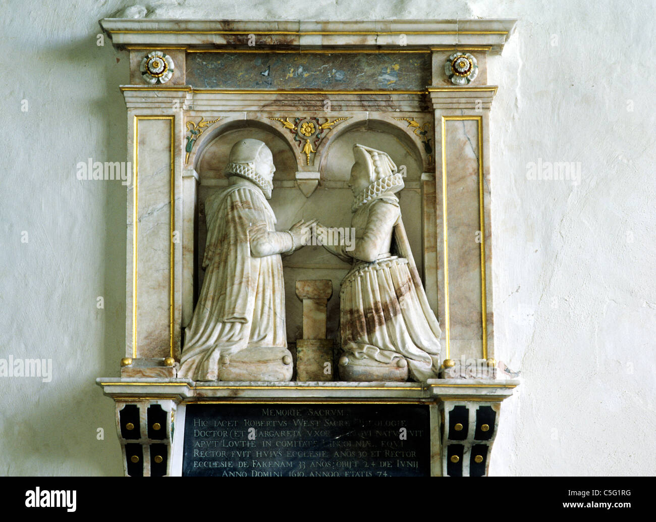 Grande il russamento, Norfolk. Monumento a Robert West e la moglie, 1610, inginocchiamento figure del xvii secolo monumento di alabastro monumenti Foto Stock