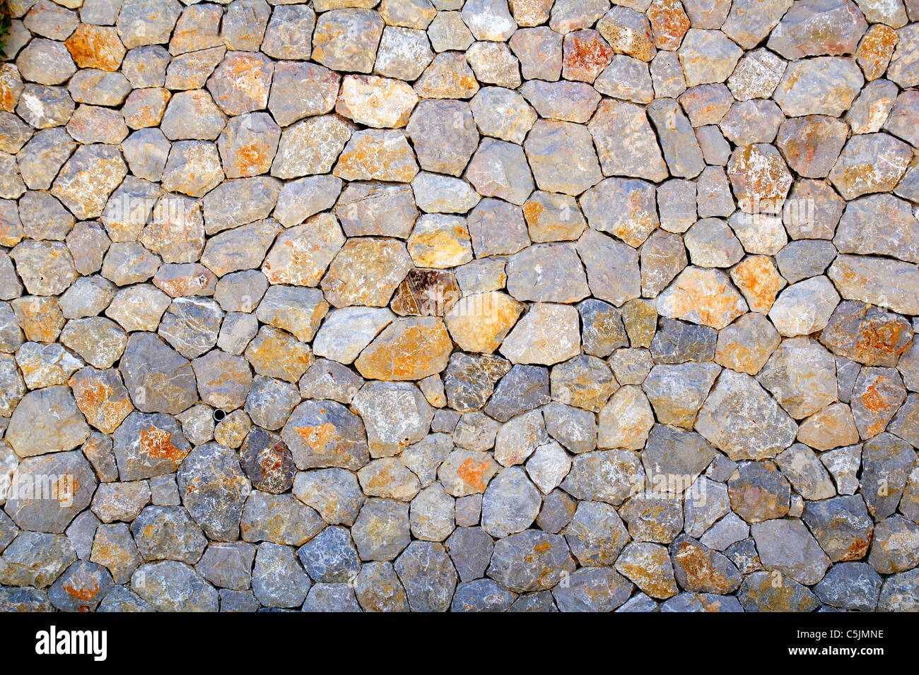 Le Baleari tipica muratura di pietra mosaico perfetto sfondo texture Foto Stock