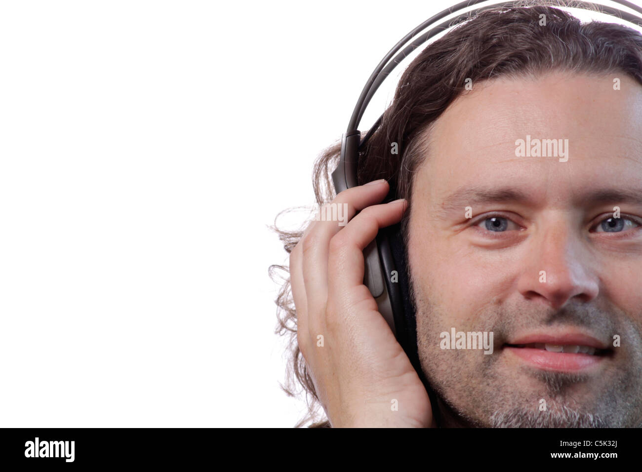 Un uomo è in ascolto musica Foto Stock