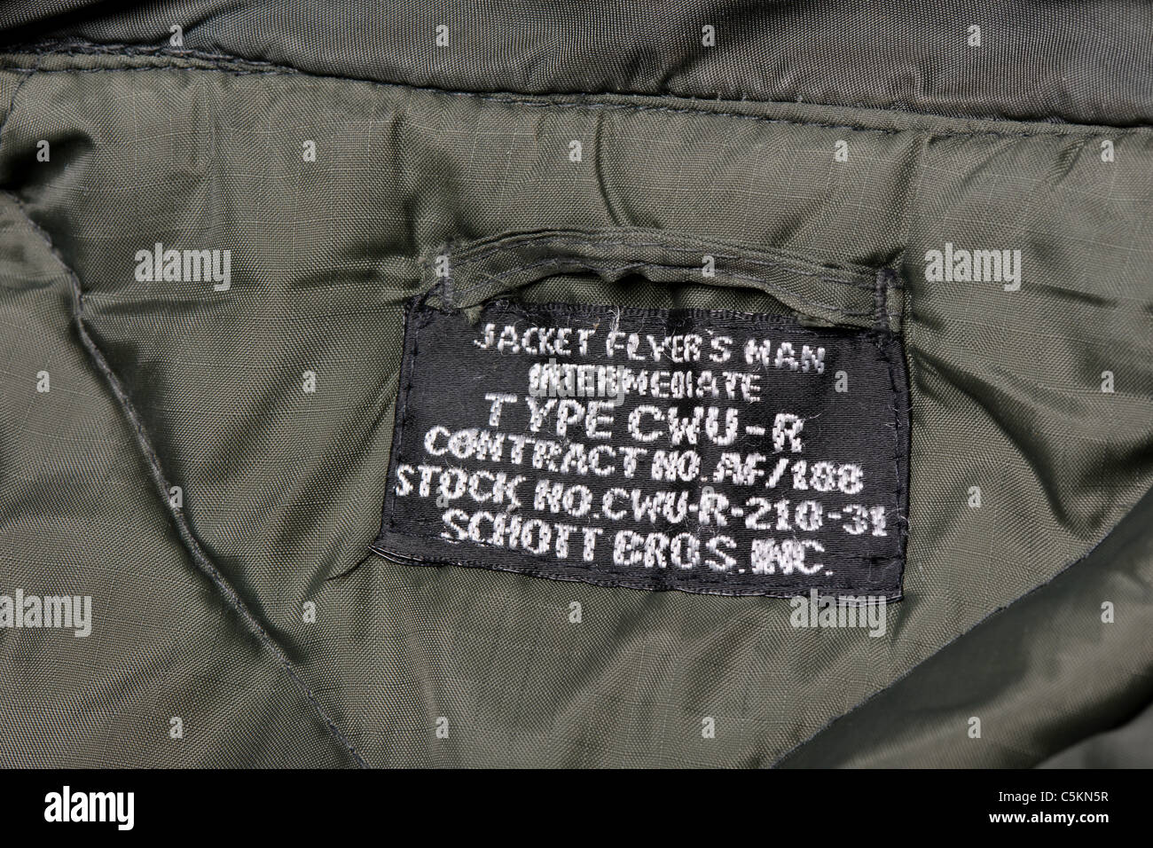 Gli uomini del marchio Schott Giubbotto imbottito, volo militare camicia come indossati dai piloti della Air Force. Rivestimento interno etichetta/badge. Foto Stock