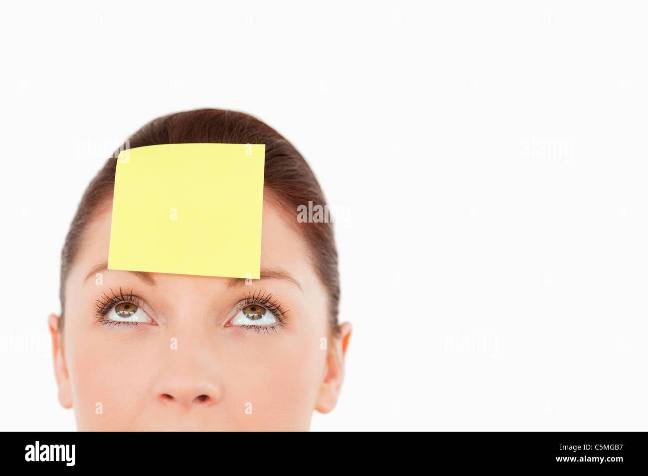Carino donna con un segno sulla sua fronte Foto Stock