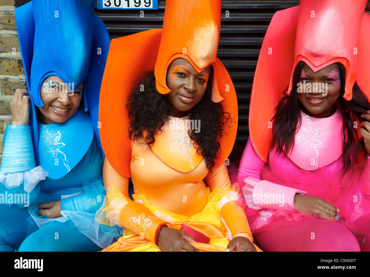 West Indian ragazze in Costume di Carnevale carnevale di Notting Hill Londra REGNO UNITO Foto Stock