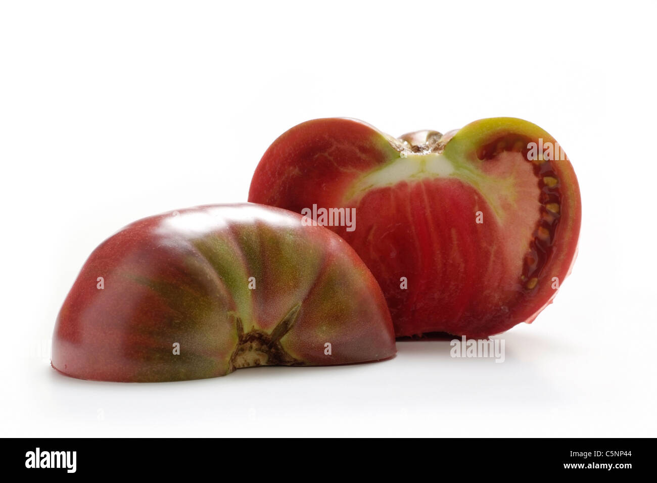 Varietà di pomodoro: Principe Nero, due metà Foto Stock