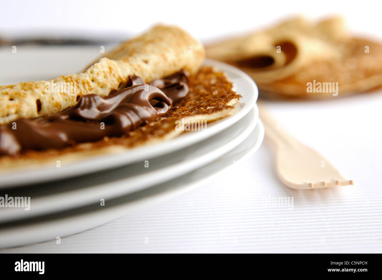 Pancake con crema al cioccolato Foto Stock