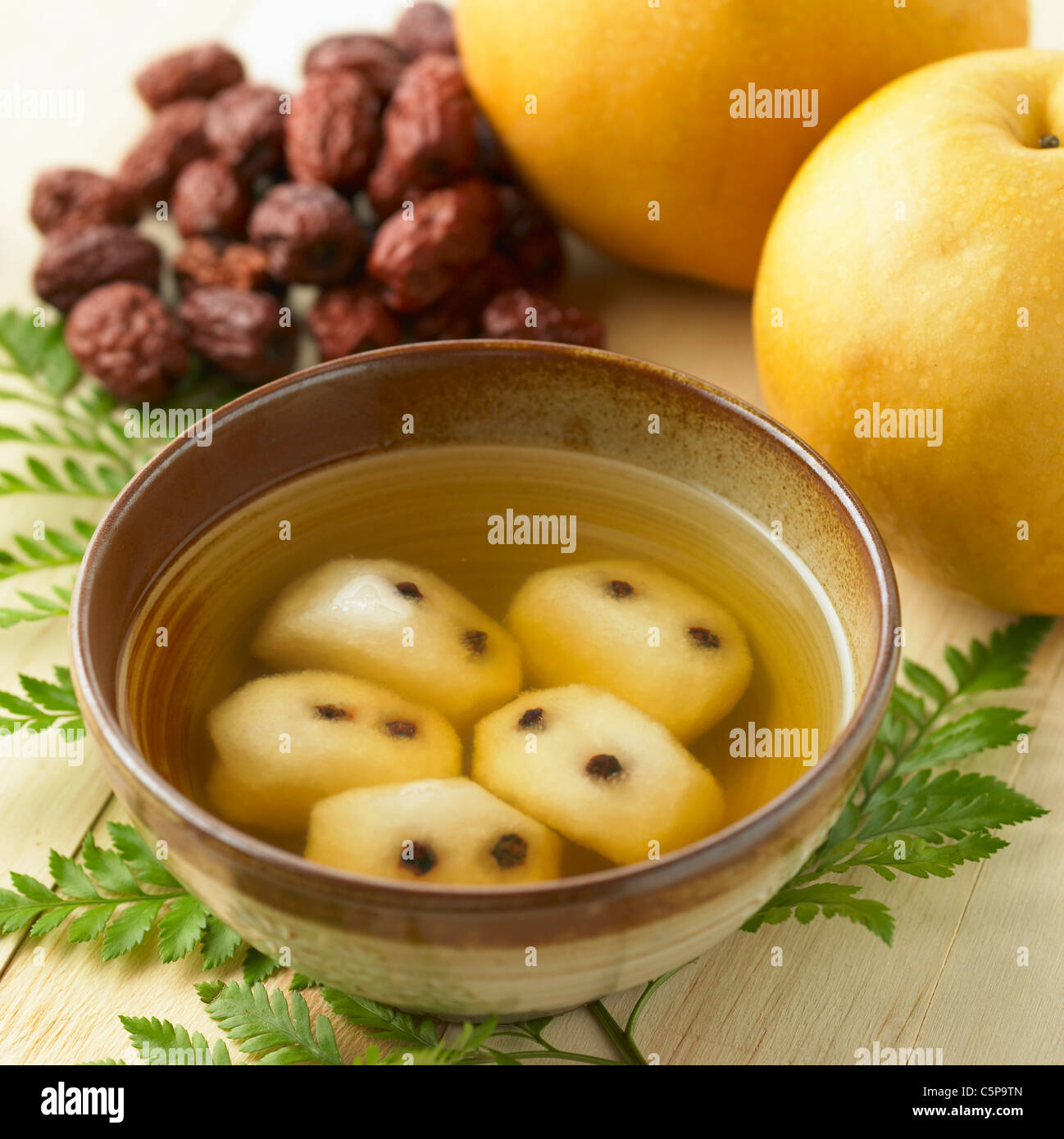 Bollito di pera conservate nel miele Foto Stock