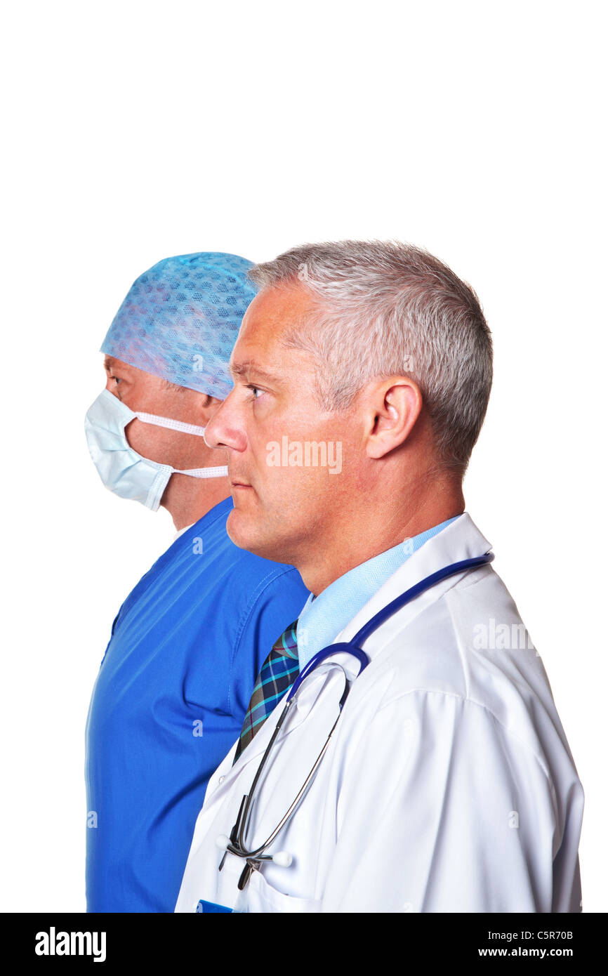 Foto di un medico e un chirurgo i profili laterali, isolata su uno sfondo bianco. Foto Stock